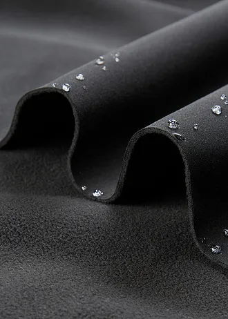 Geacă impermeabilă din softshell cu croială de bluzon, cu glugă • negru-albastru arctic • magazin bonprix