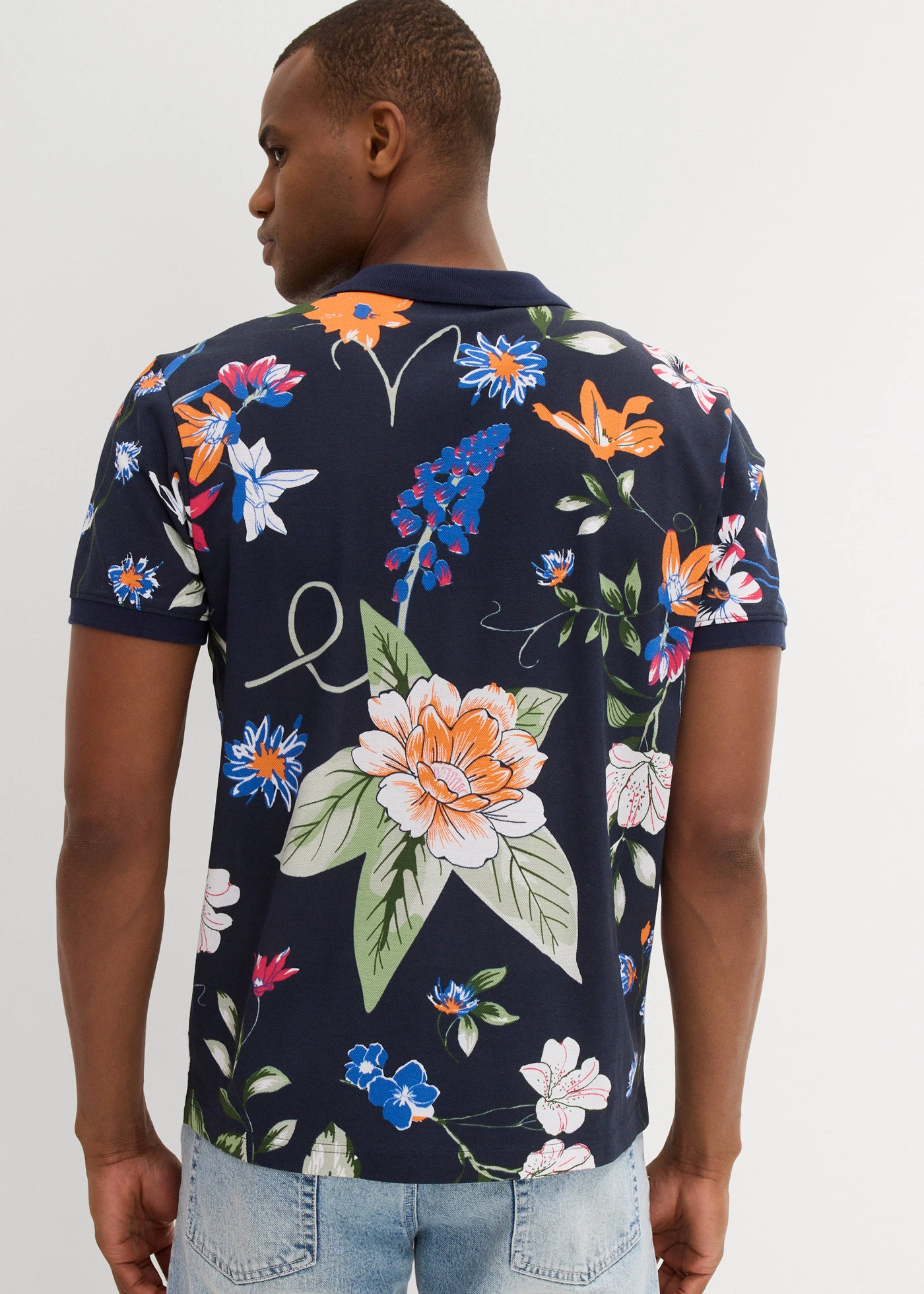 Polo 100% coton en maille piquée • bleu foncé floral • Boutique bonprix