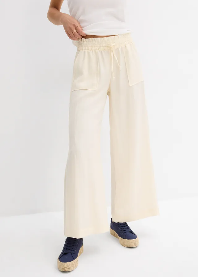 Pantalon large et fluide en lyocell mélangé • crème • product-page.page-title-suffix