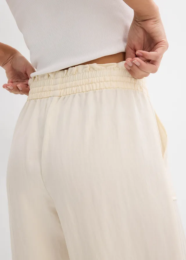 Pantalon large et fluide en lyocell mélangé • crème • product-page.page-title-suffix
