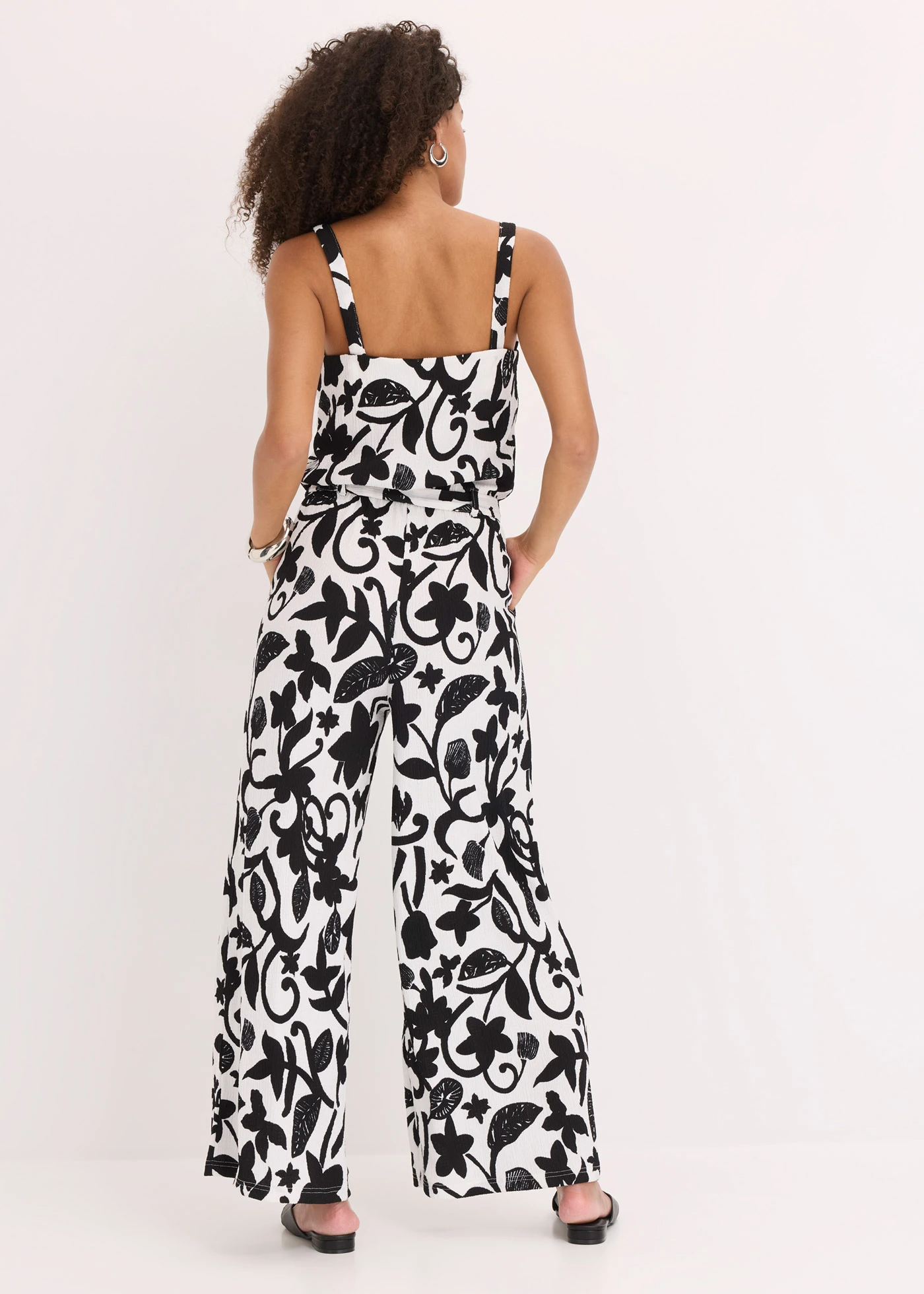 Combinaison imprimée en jersey texturé • écru/noir floral • Boutique bonprix