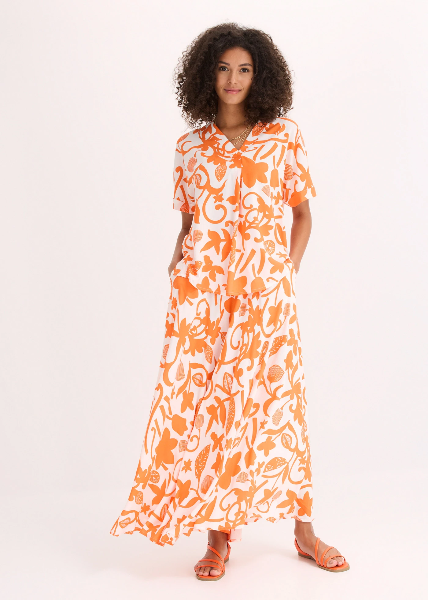 Tuniekblouse van soepele viscose met print • wolwit-mango gebloemd • bonprix online shop