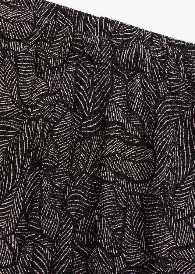 Pantalon en jersey crêpe texturé • noir/blanc • product-page.page-title-suffix