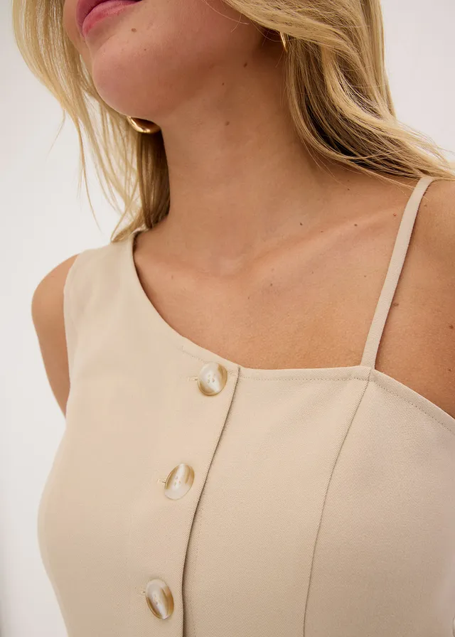 Bodywarmer met knopen • beige • product-page.page-title-suffix