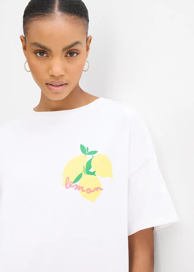 Oversized shirt van puur biologisch katoen • wit-soft geel met print • product-page.page-title-suffix