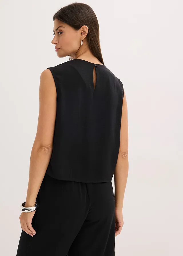 Mouwloze bloes met knoop • zwart • product-page.page-title-suffix