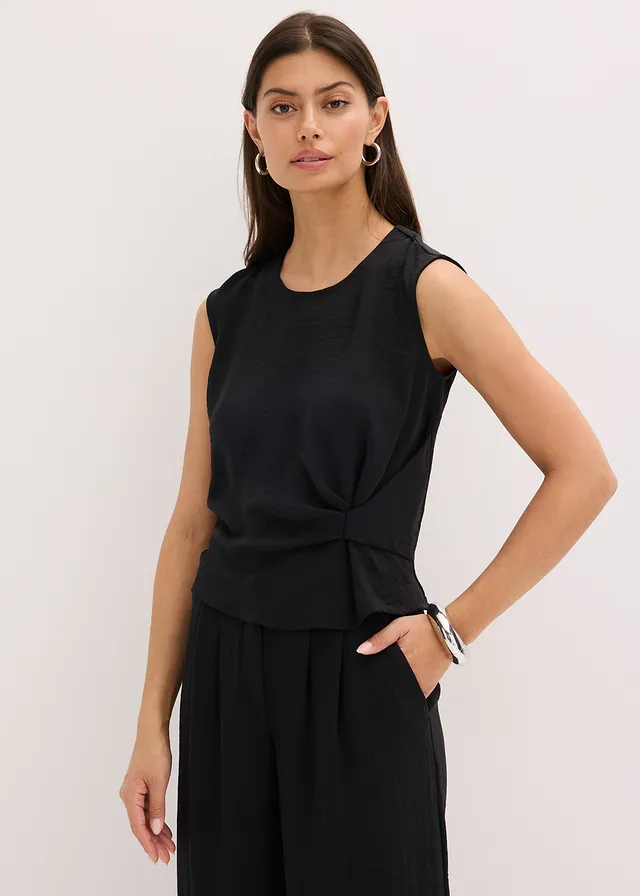 Mouwloze bloes met knoop • zwart • product-page.page-title-suffix