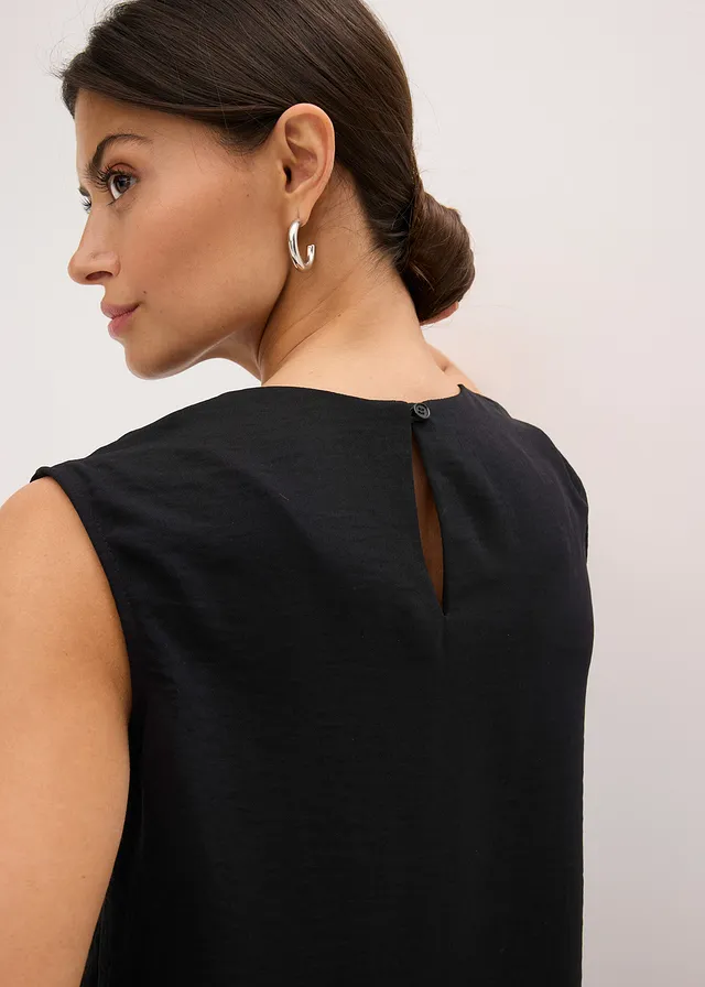 Mouwloze bloes met knoop • zwart • product-page.page-title-suffix