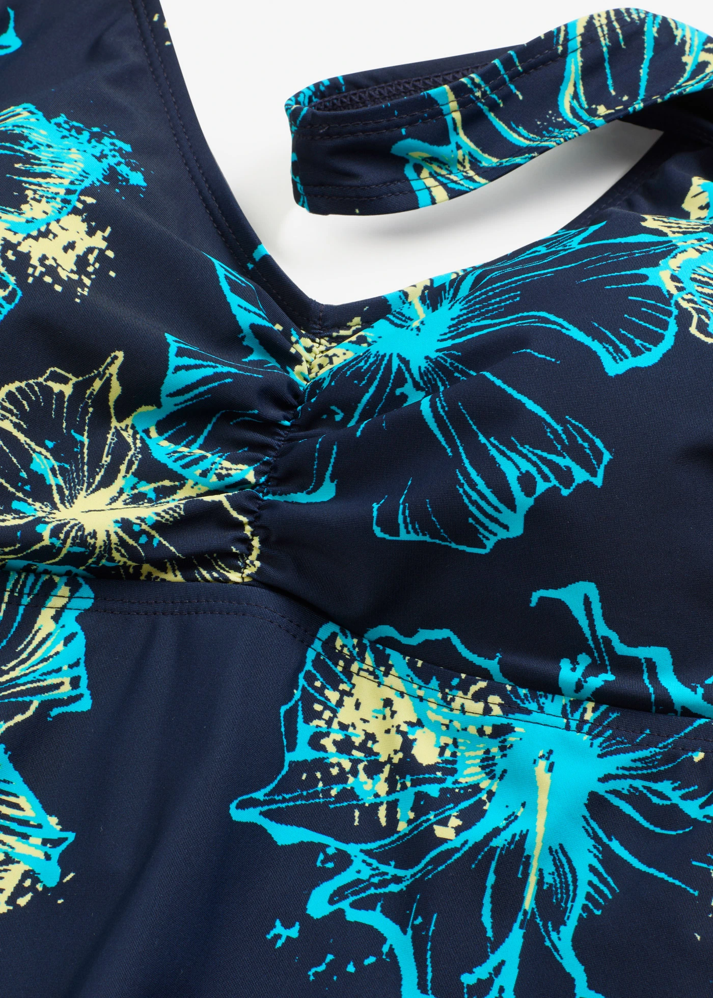 Corrigerende badpakjurk met V-hals, medium corrigerend • donkerblauw-turkoois-geel gedessineerd • bonprix online shop