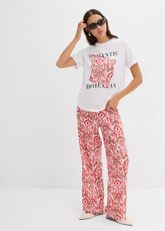 Pantalon jogger en crêpe texturé • blanc/rouge imprimé • product-page.page-title-suffix