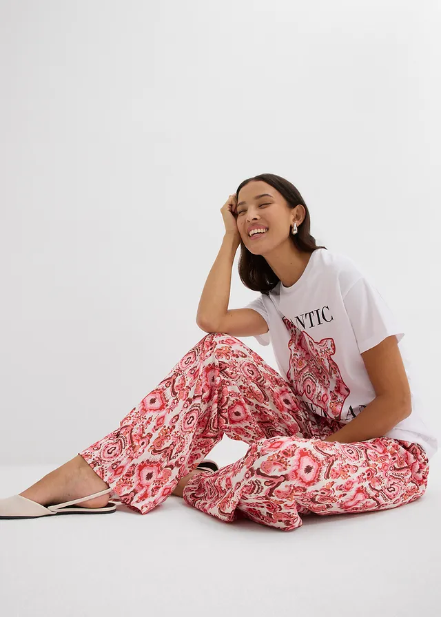 Pantalon jogger en crêpe texturé • blanc/rouge imprimé • product-page.page-title-suffix