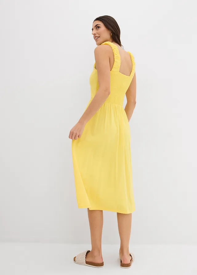 Jurk in een iets uitlopend model van een katoen-viscosemix • tulpengeel • product-page.page-title-suffix