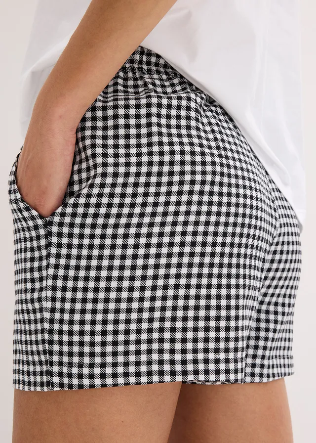 Oversized shortama met een geweven short • wit geruit • product-page.page-title-suffix