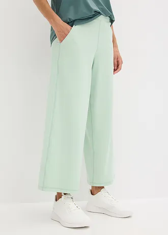 Comfort capri sportbroek met wijde pijpen, sneldrogend • lichtrietgroen • bonprix online shop