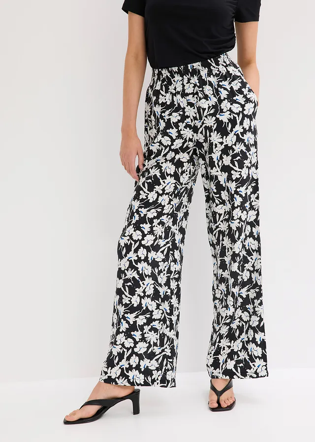 Pantalon palazzo en tissu texturé • noir/écru floral • product-page.page-title-suffix