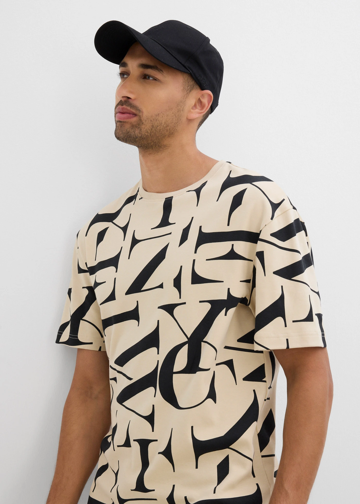 Tričko z těžké, čisté organické bavlny • světle pískovo-černá s potiskem • bonprix obchod