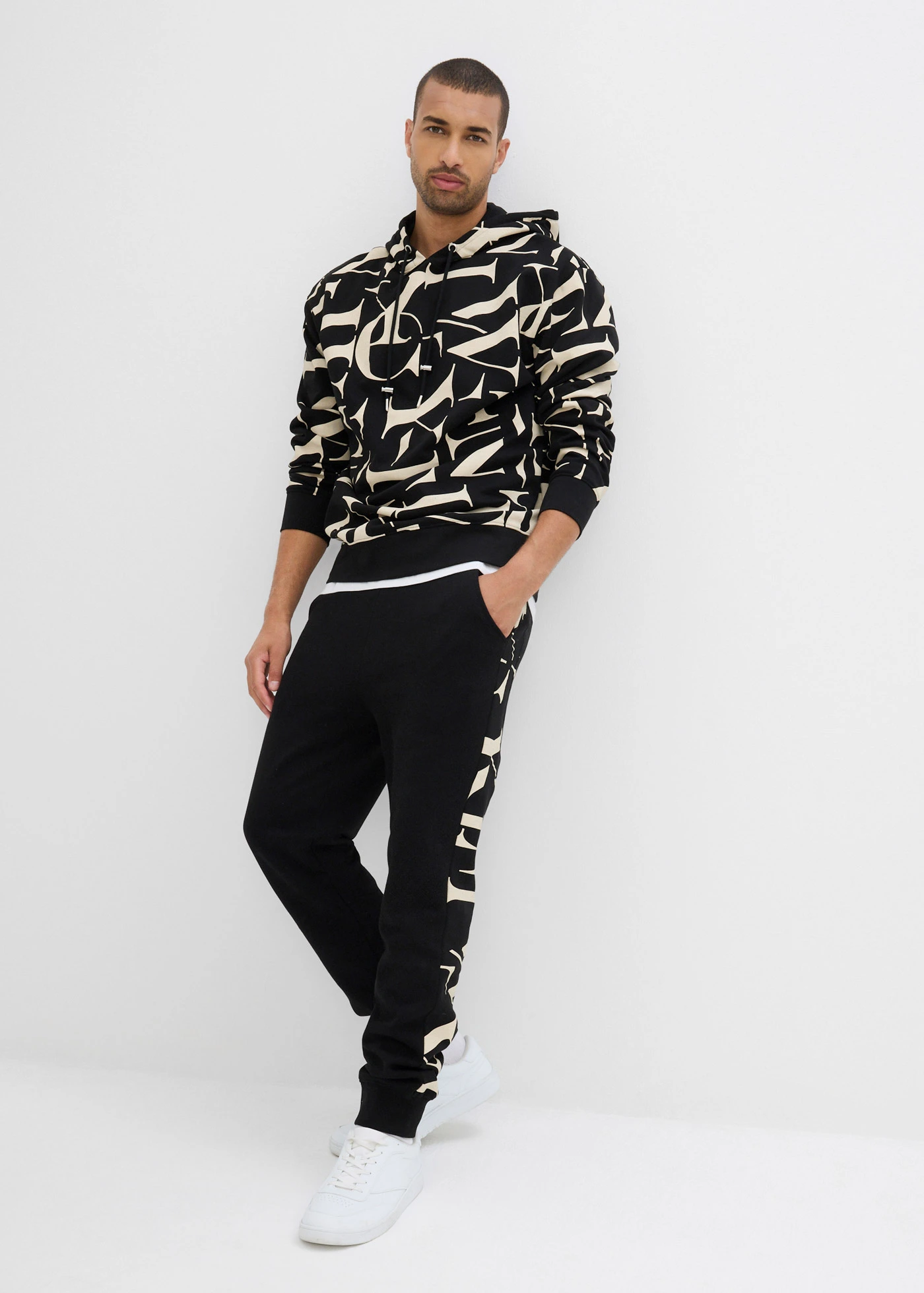 Szabadidőnadrág betéttel, tiszta bio-pamutból • fekete-világos homok • bonprix áruház