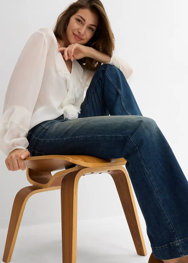 Flared jeans, mid waist • donkerblauw denim • product-page.page-title-suffix