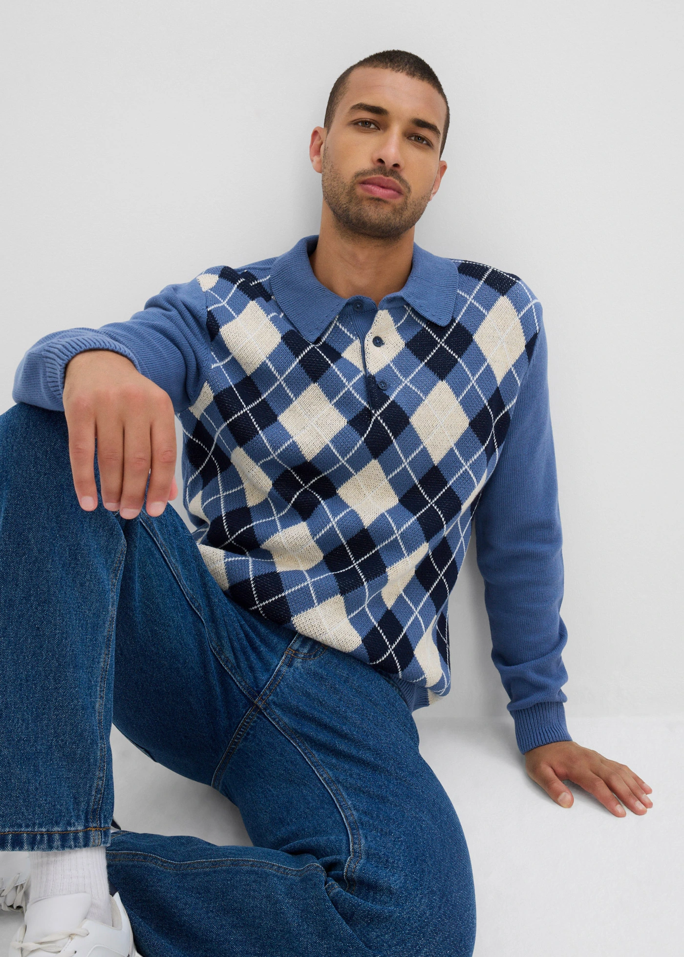 Polo-trui met Argylepatroon van puur katoen • jeansblauw-donkerblauw-ecru gemêleerd geruit • bonprix online shop