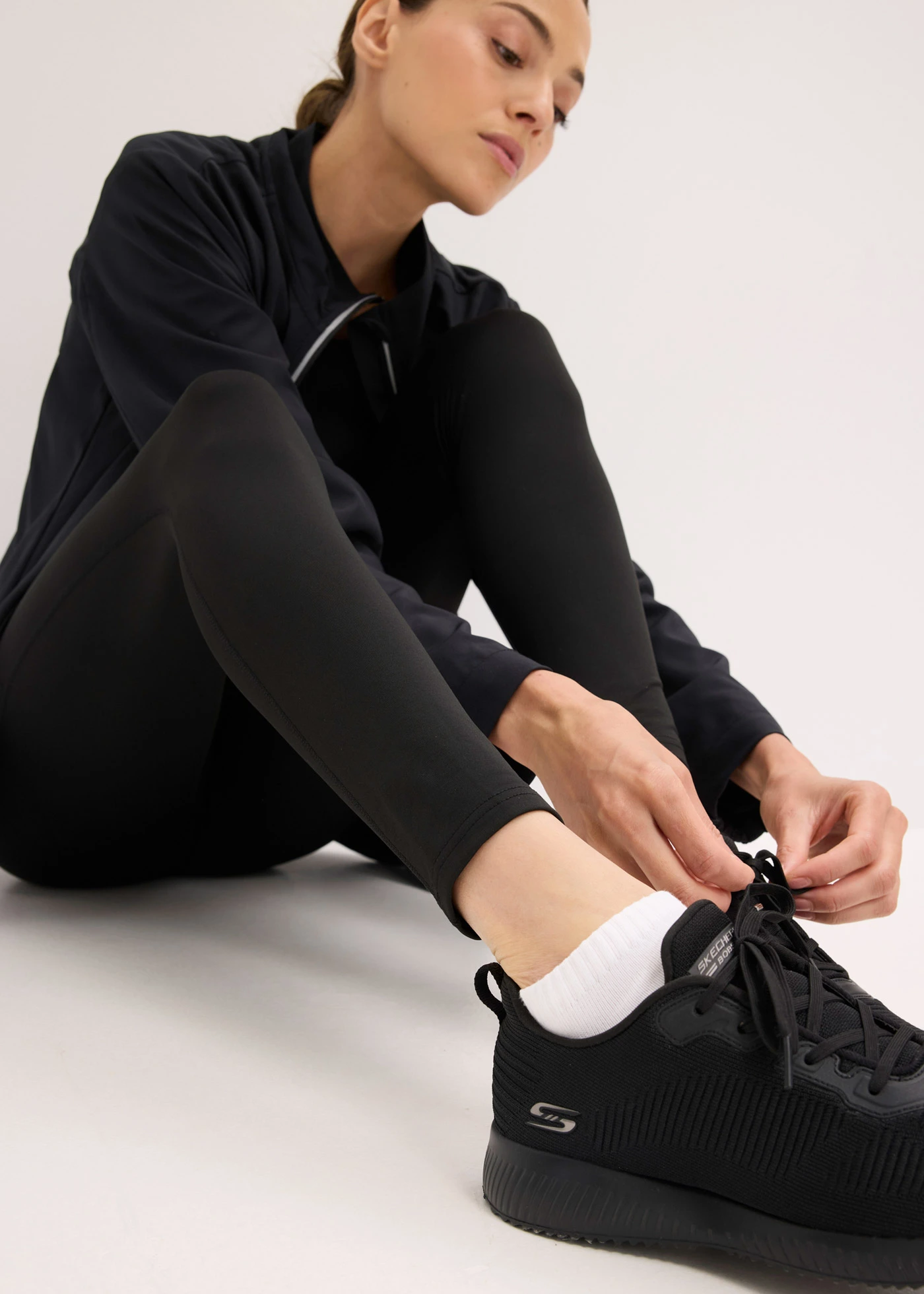 Termo legíny s reflexními detaily a kapsičkou na mobilní telefon • černá • bonprix obchod