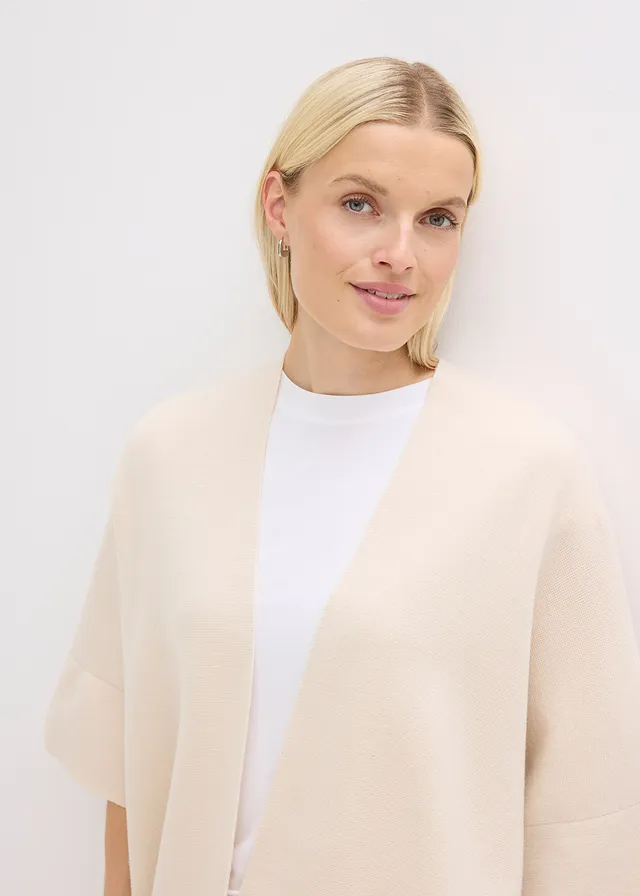 Oversized gebreide cape • kiezelbeige gemêleerd • product-page.page-title-suffix