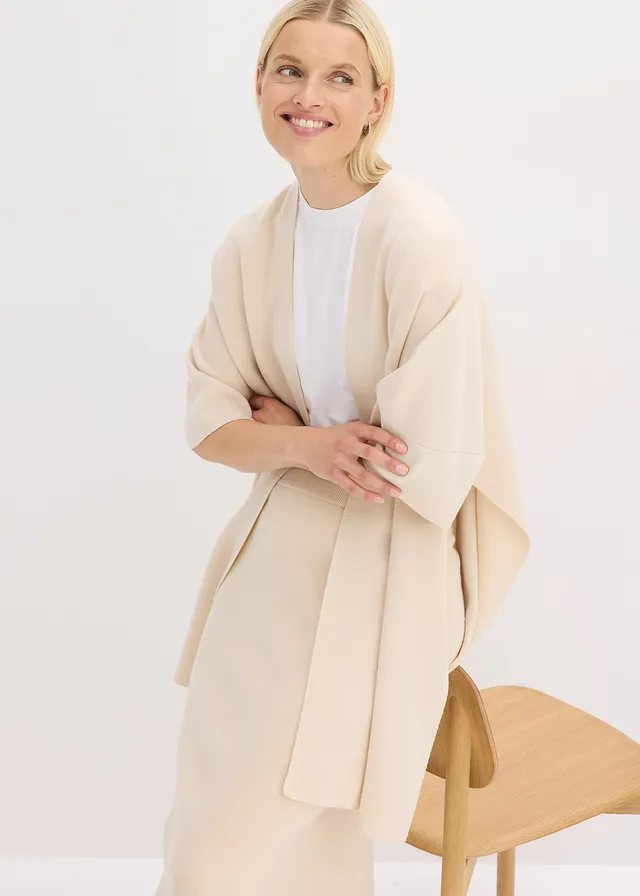 Oversized gebreide cape • kiezelbeige gemêleerd • product-page.page-title-suffix