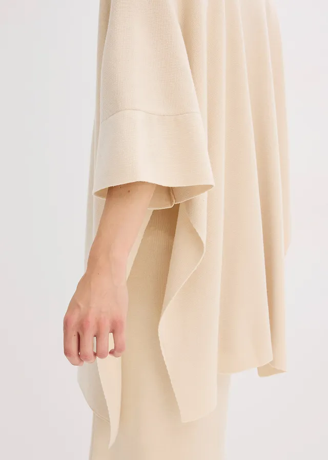 Oversized gebreide cape • kiezelbeige gemêleerd • product-page.page-title-suffix