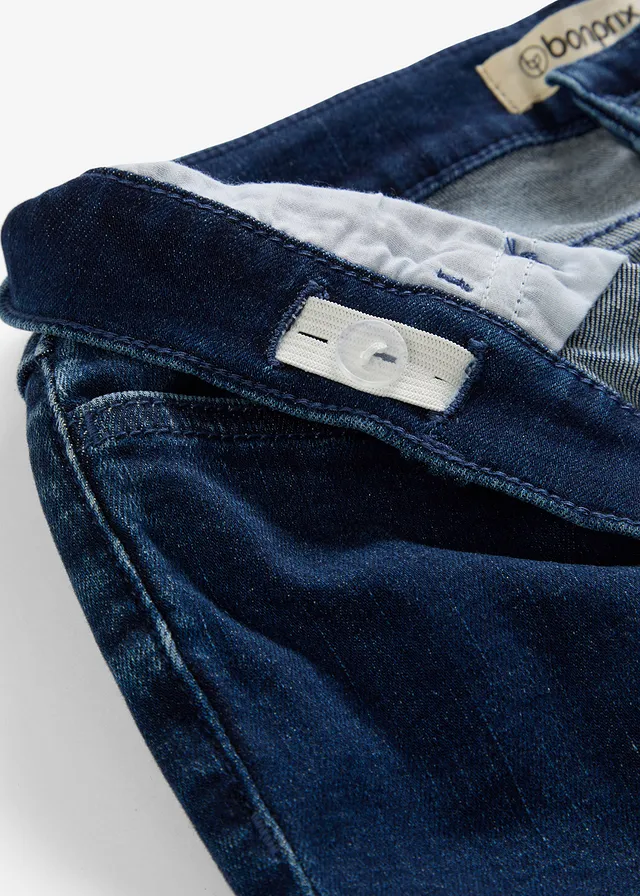 Flared jeans, low waist • blauw denim • product-page.page-title-suffix