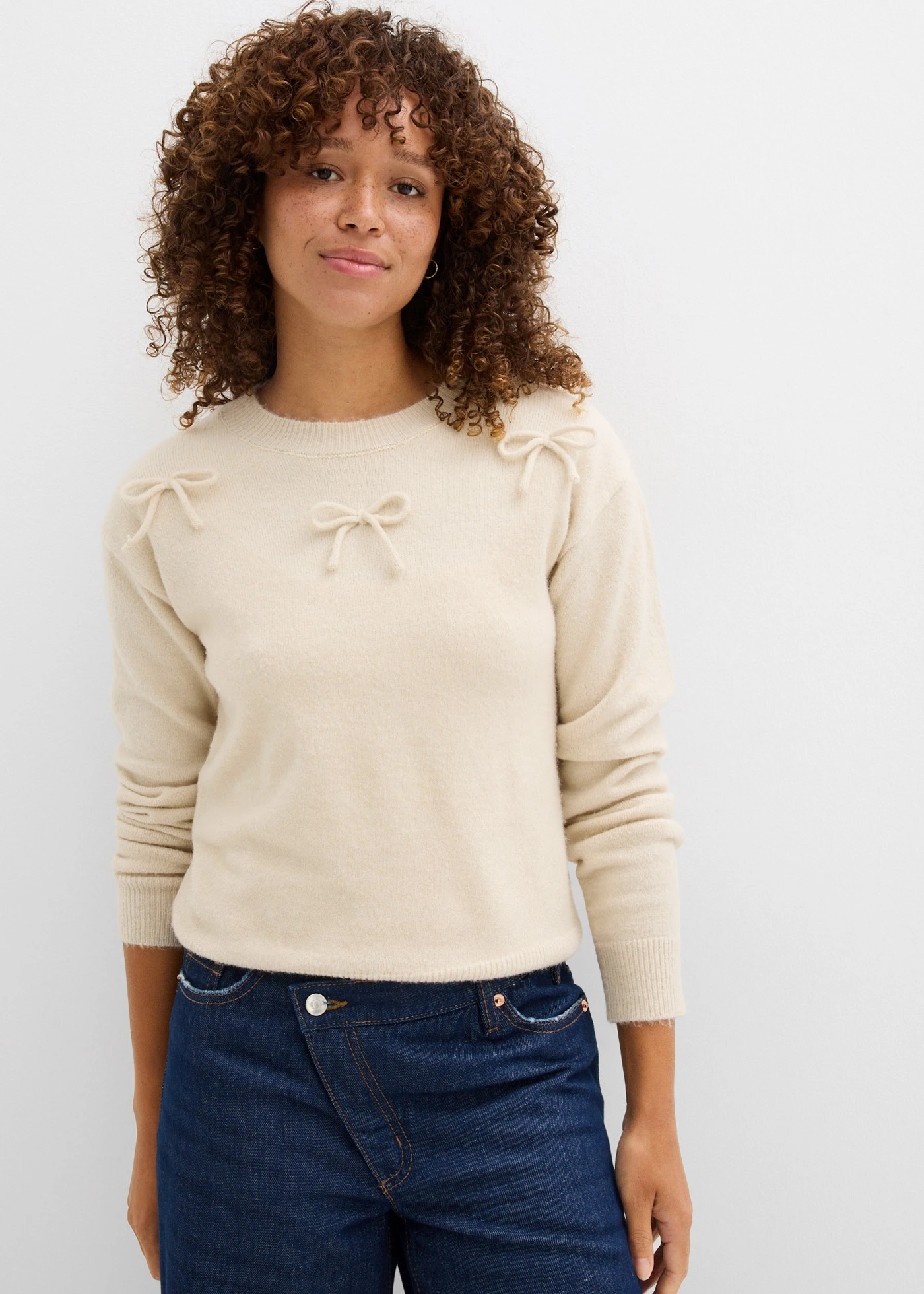 Pull avec nœuds • sable clair chiné • Boutique bonprix