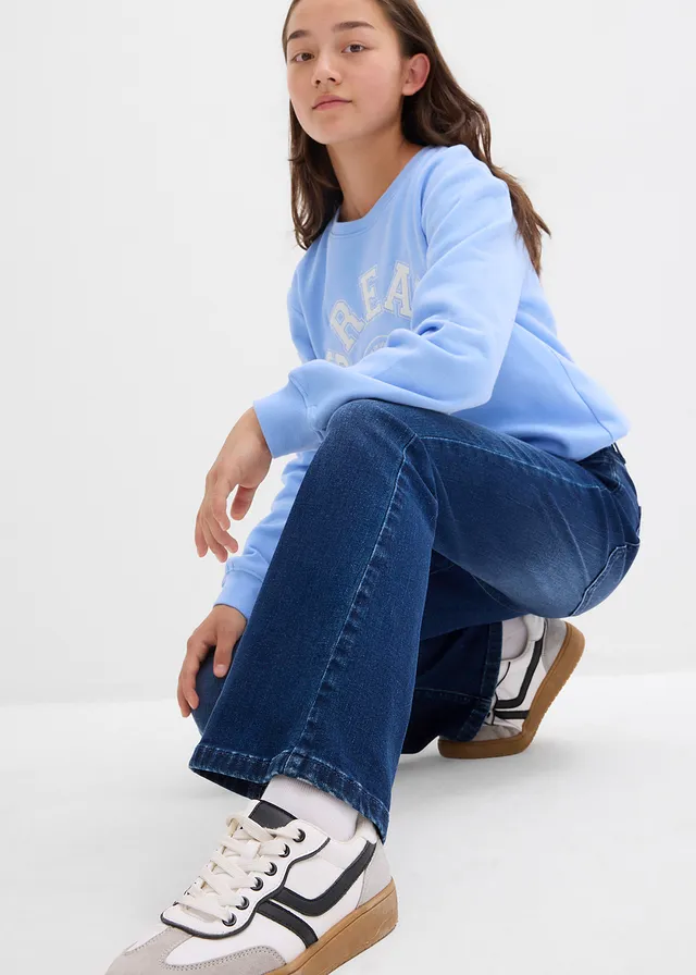 Flared jeans, low waist • blauw denim • product-page.page-title-suffix
