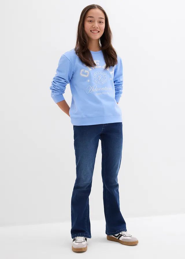 Flared jeans, low waist • blauw denim • product-page.page-title-suffix