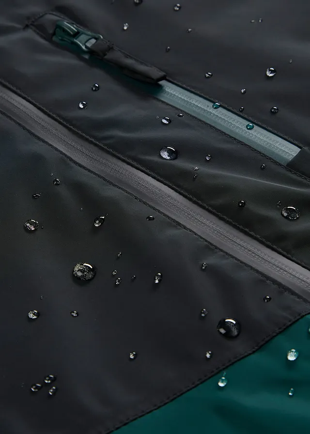 Waterdichte winterjas in colourblocking met capuchon • diepgroen/zwart • product-page.page-title-suffix