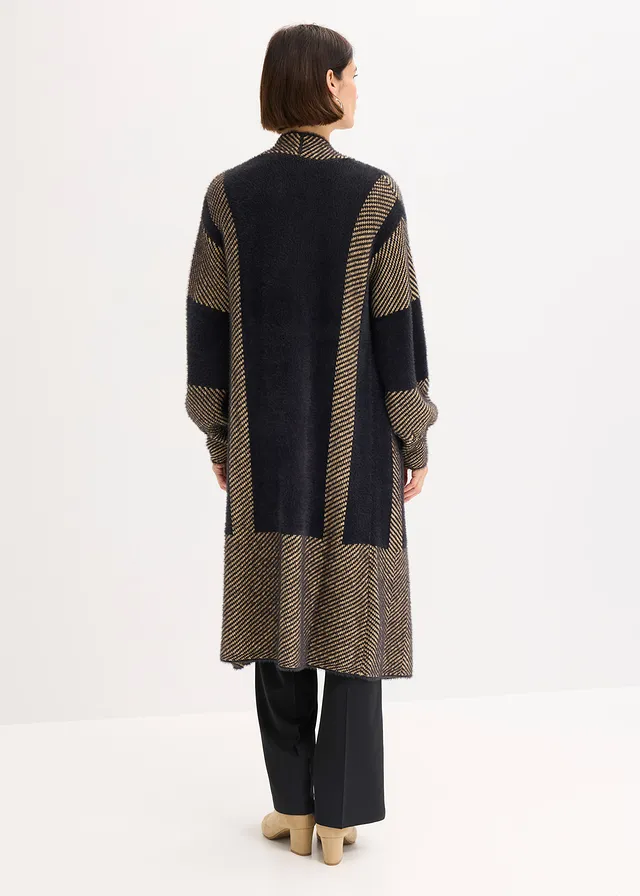 Lang gebreid vest • zwart-latte macchiato • product-page.page-title-suffix