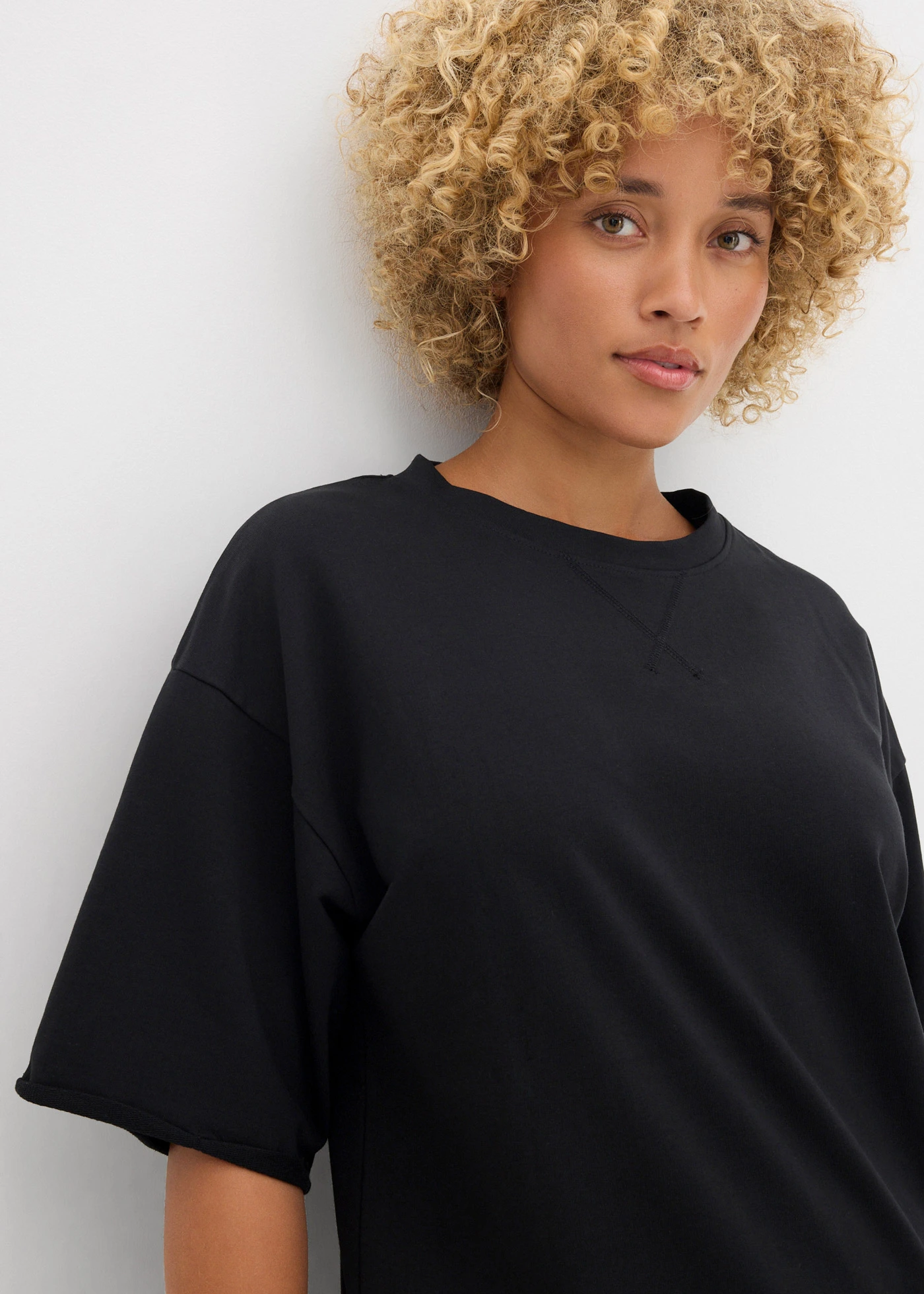 T-shirt long en sweat 100% coton • noir • Boutique bonprix