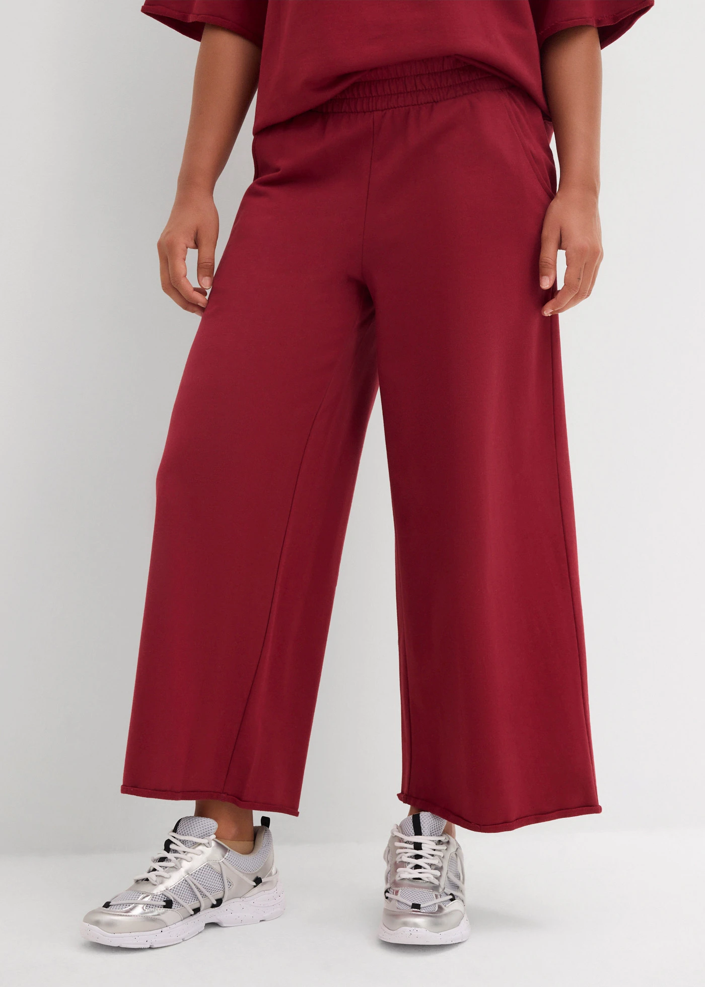 Sweatpants van biologisch katoen, 7/8 lengte • pruimrood • bonprix online shop