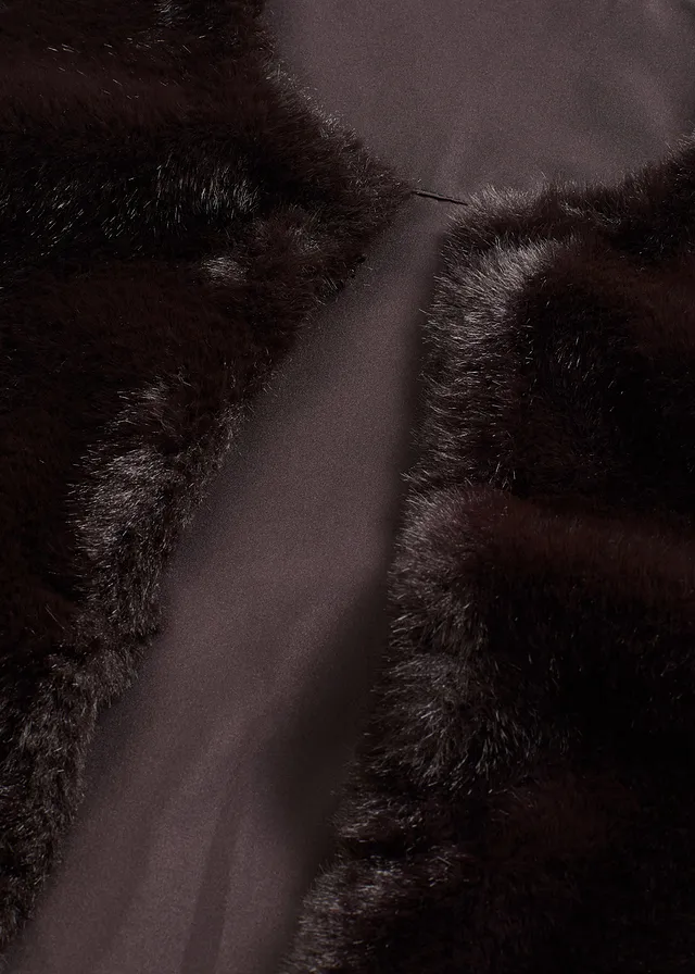 Gilet sans manches en peluche • noir • product-page.page-title-suffix
