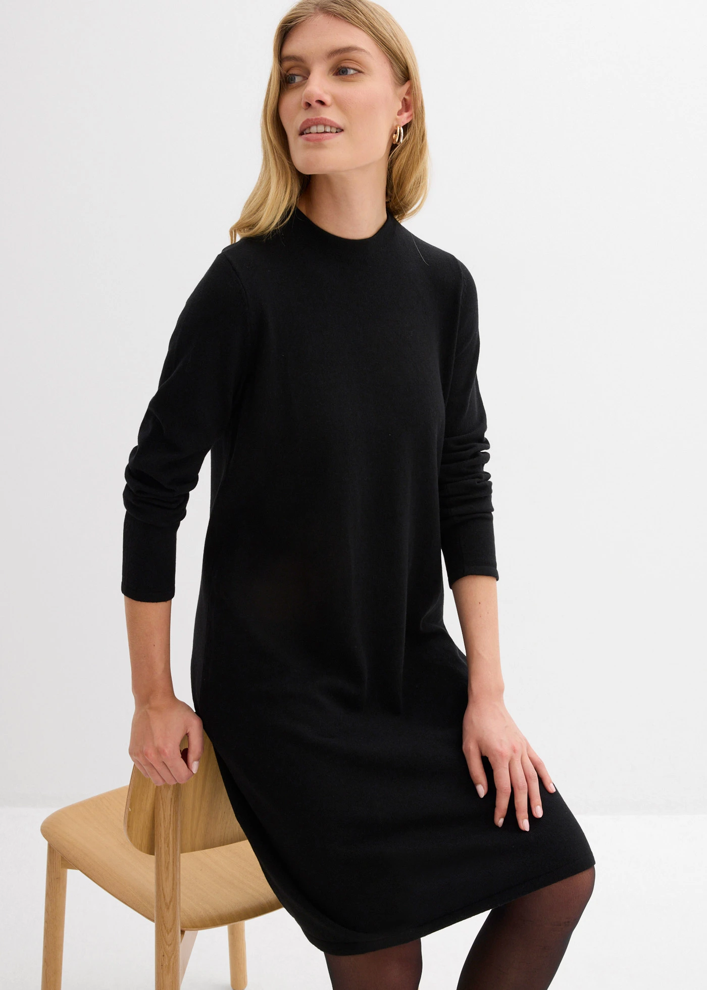 Pletené šaty v áčkové linii • černá • bonprix obchod