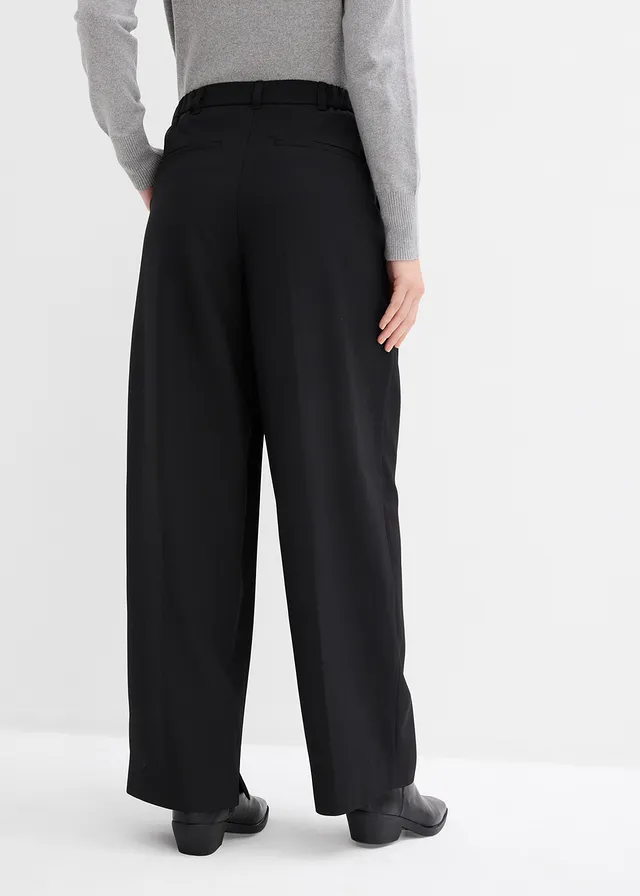 Broek met plooien, comfortabele tailleband en split • zwart • product-page.page-title-suffix