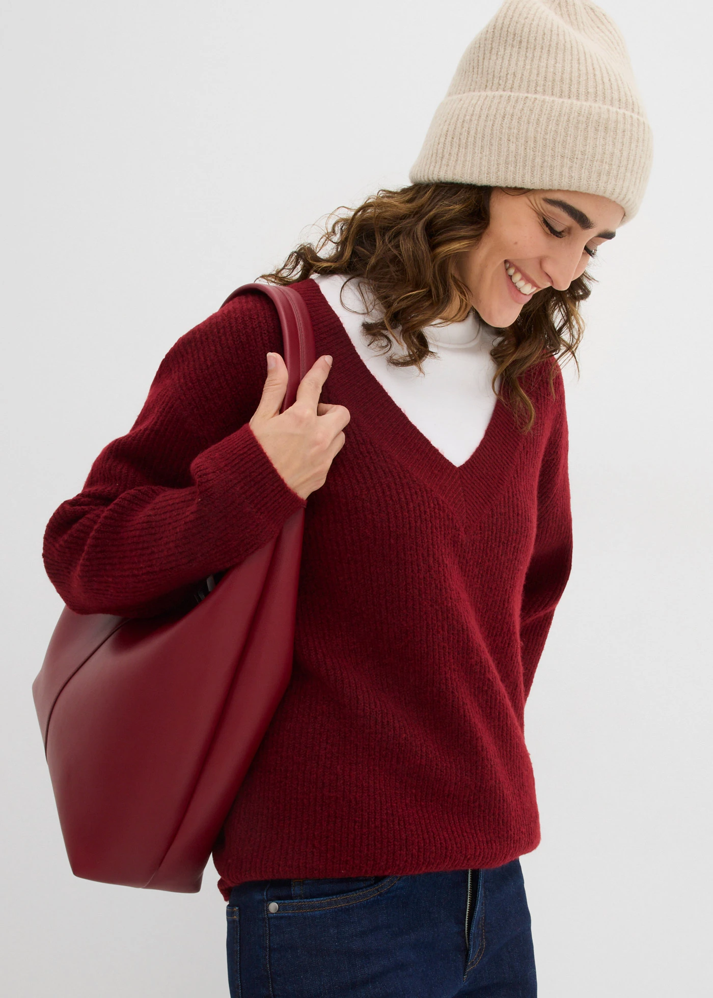 Pletený svetr s hlubokým výstřihem do V • červená-černá melír • bonprix obchod