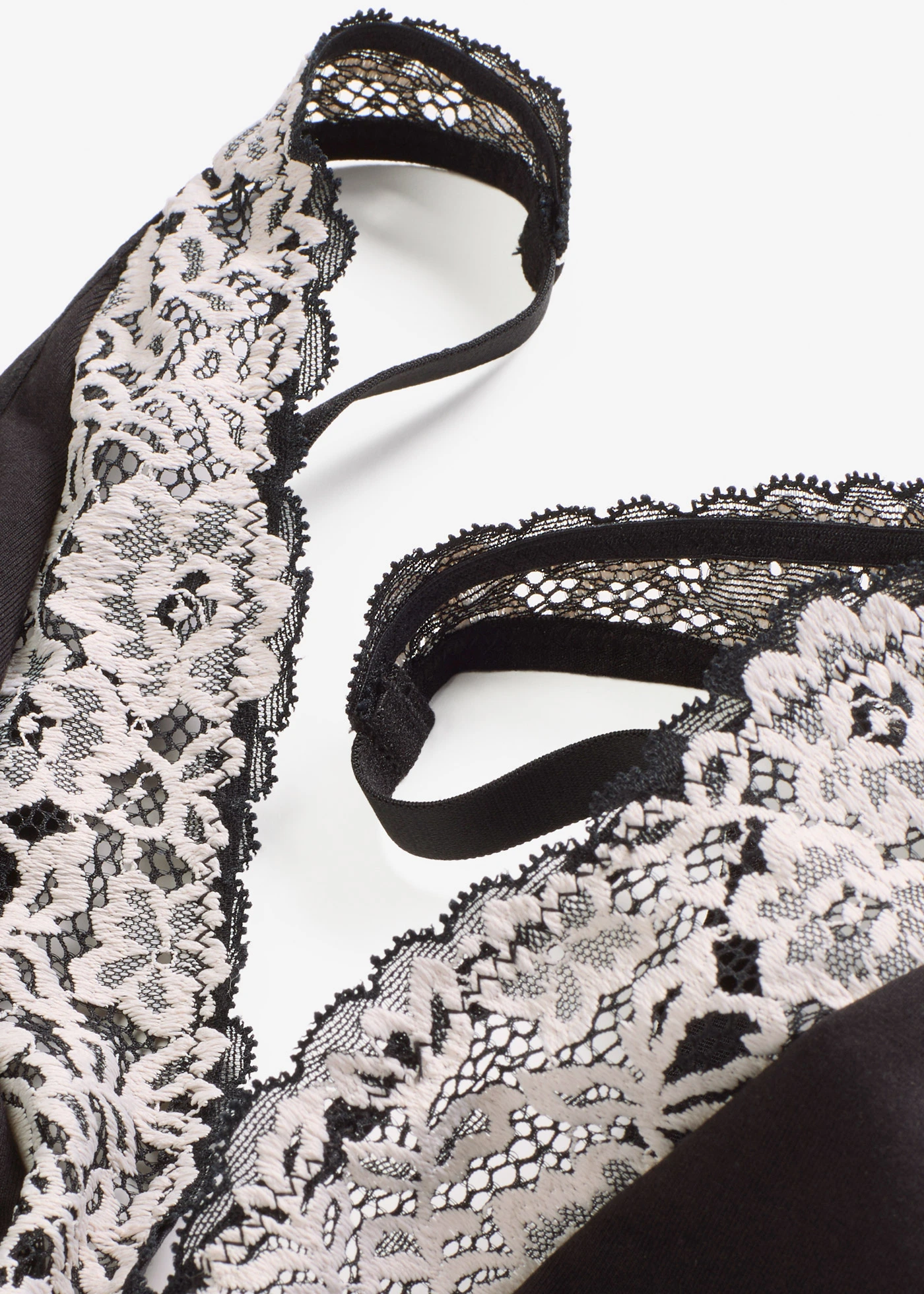 Bralette melltartó merevítő nélkül, bio-pamuttal és csipkével • fekete/gyapjúfehér • bonprix áruház