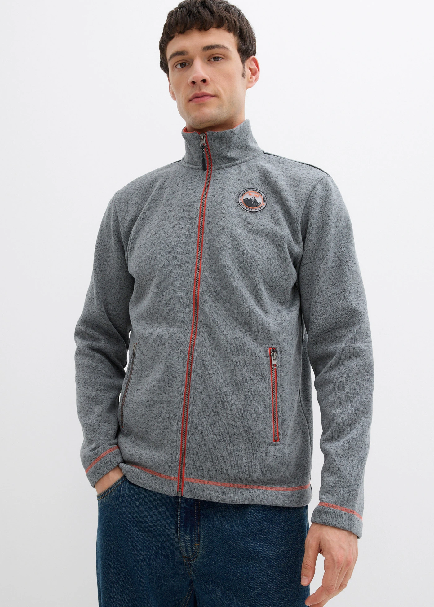 Veste zippée en maille polaire à détails contrastés • gris chiné-orange • Boutique bonprix