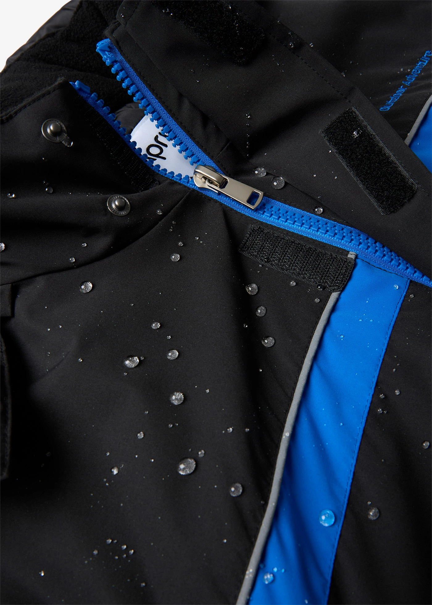 Parka imperméable en matière technique à capuche amovible • noir - bleu azur • Boutique bonprix