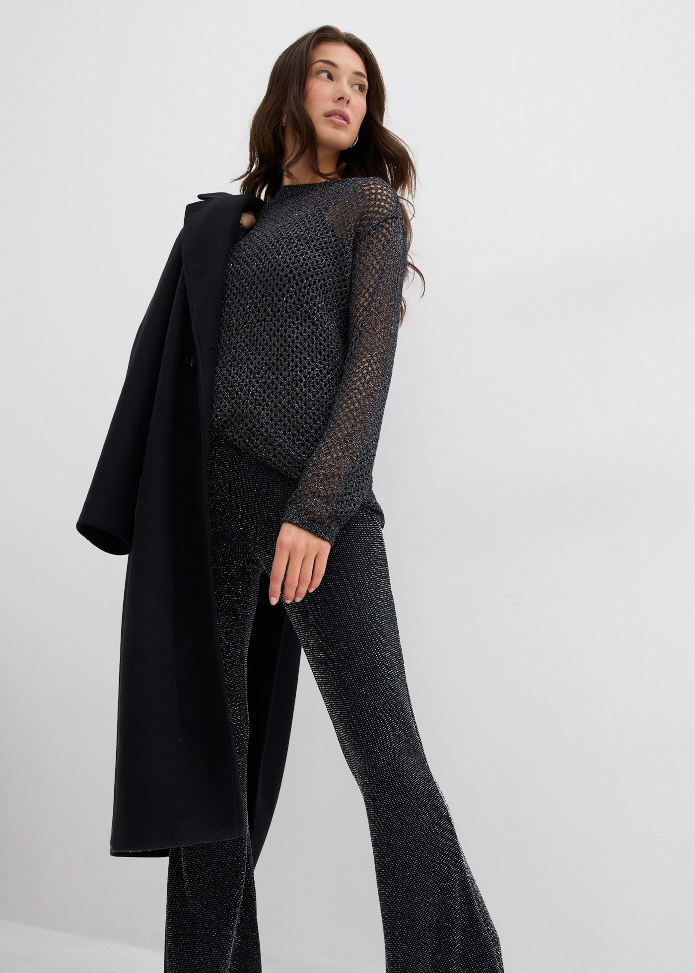 Lefelé bővülő szárú legging csillogó részletekkel • fekete • bonprix áruház