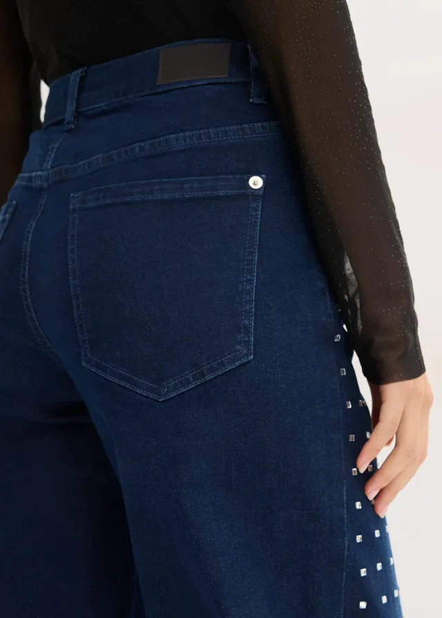 Jeansy z szerokimi nogawkami, mid waist, z aplikacją z kryształków • niebieski denim metallic • sklep bonprix