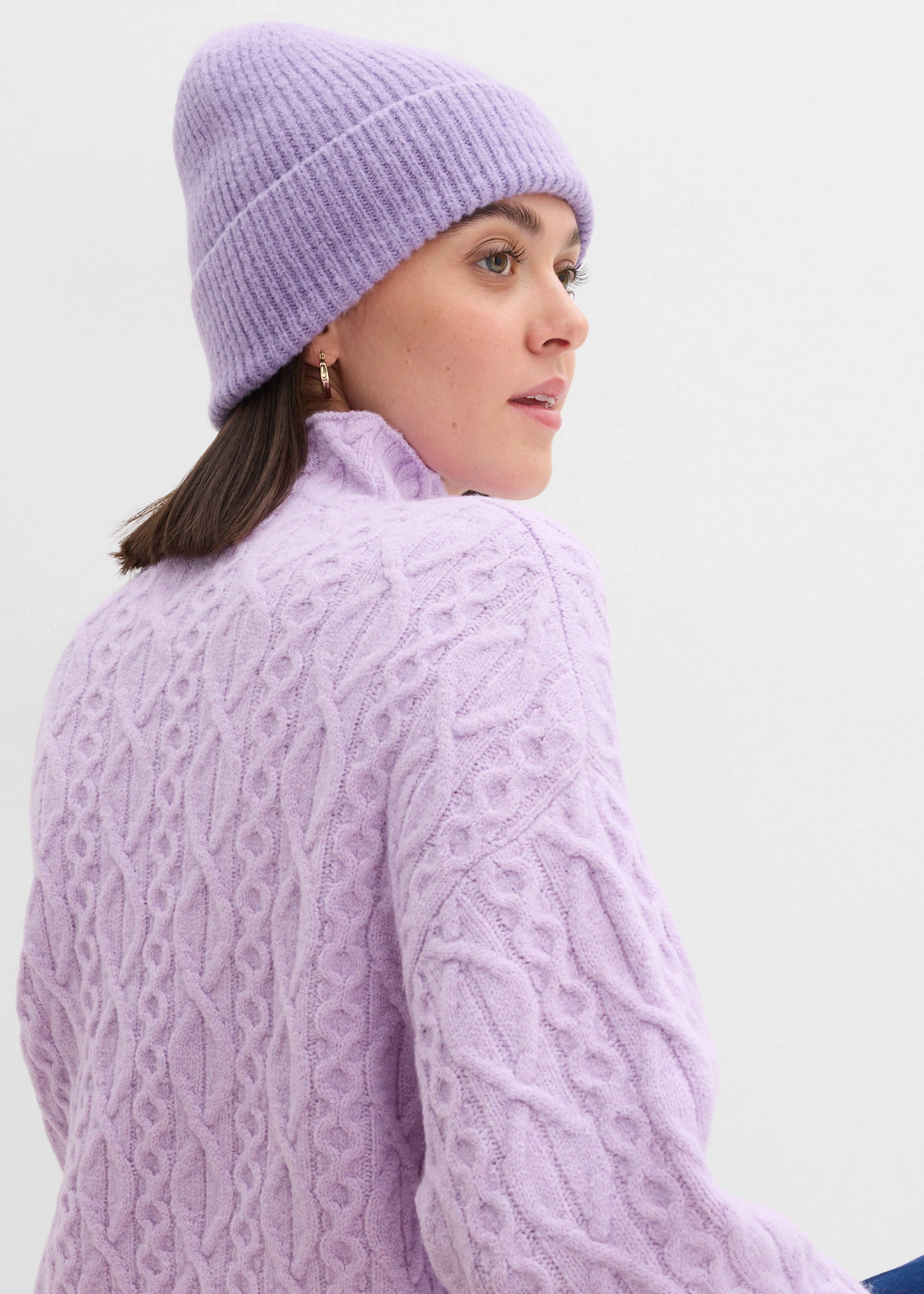 Pulover cu model tricotat în torsade • liliachiu pastel melanj • magazin bonprix