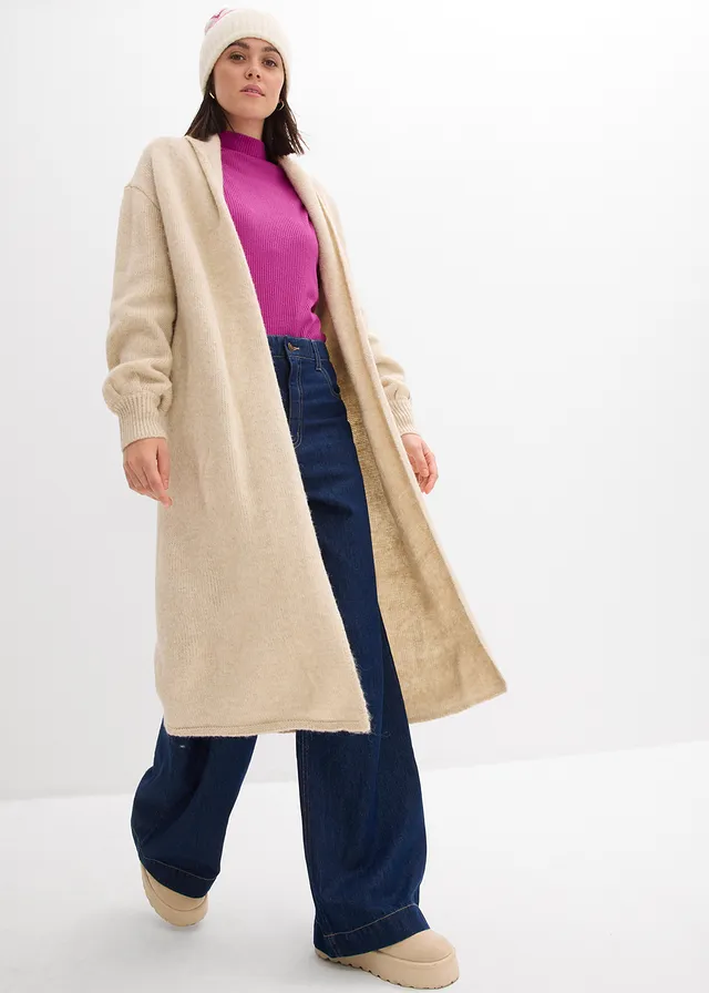 Lang gebreid vest in harige look lichtsand