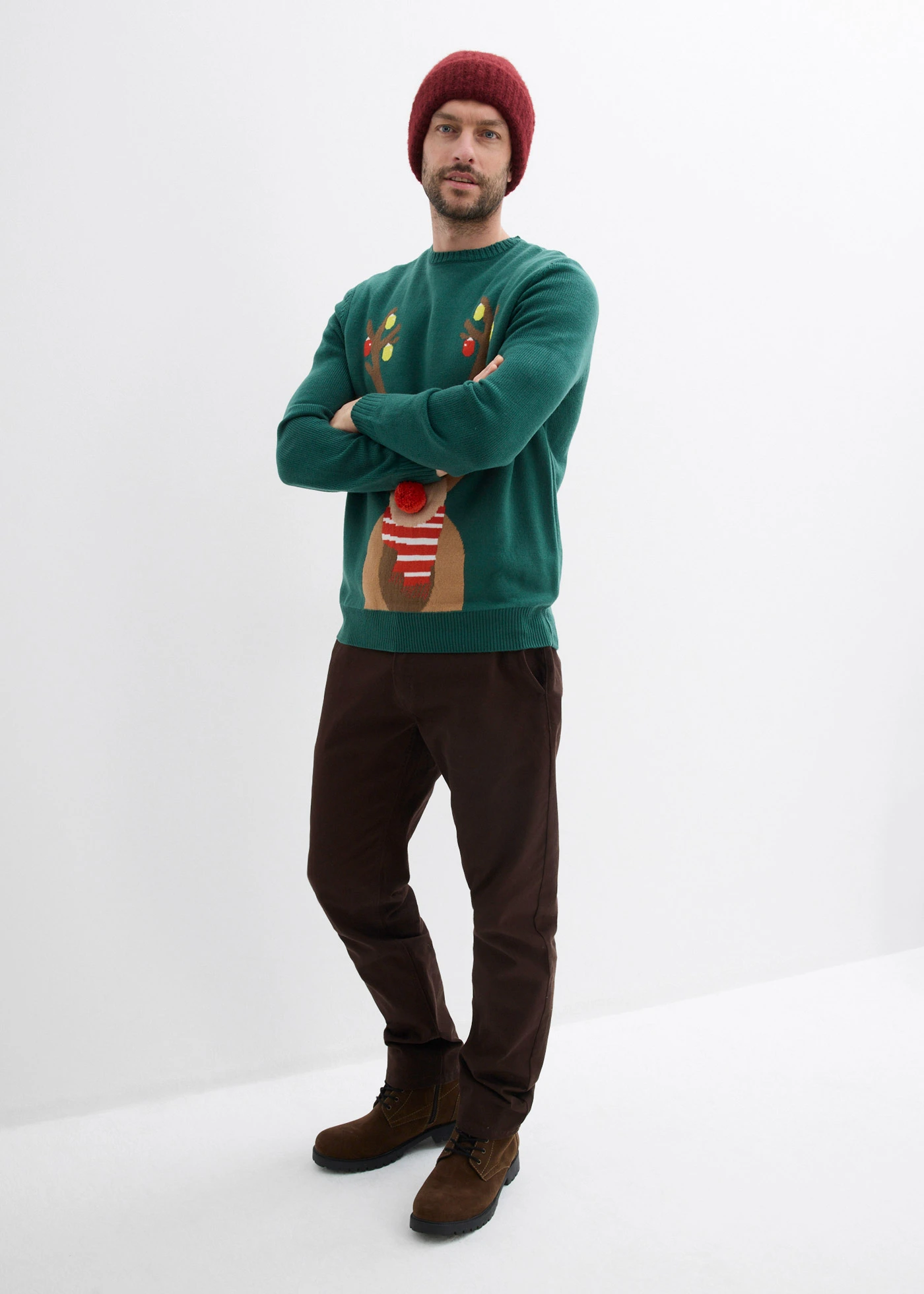 Pull avec motif de Noël • vert profond • Boutique bonprix