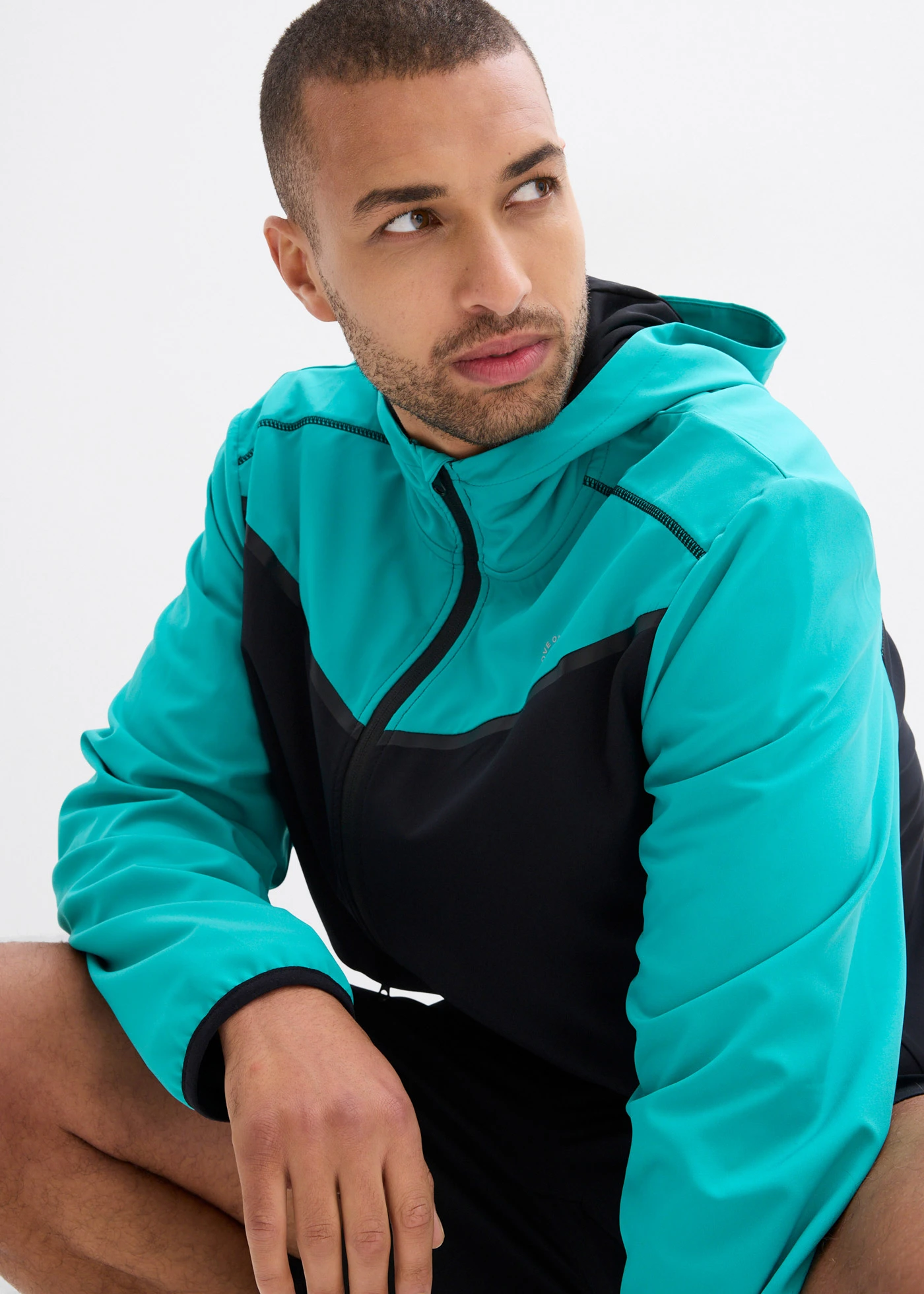 Veste de sport légère pour homme, séchage rapide • noir-émeraude • Boutique bonprix