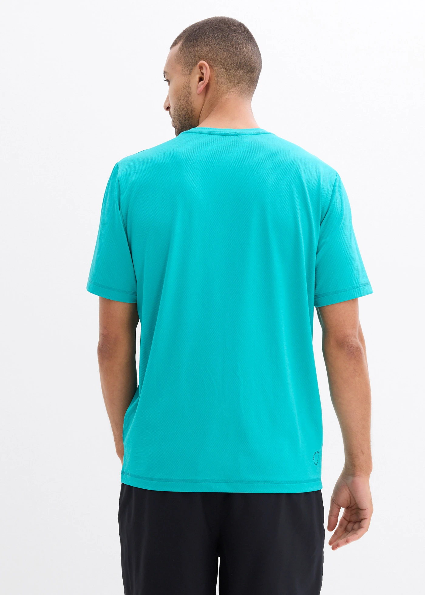 Bluză sport cu aspect texturat • verde-smarald • magazin bonprix