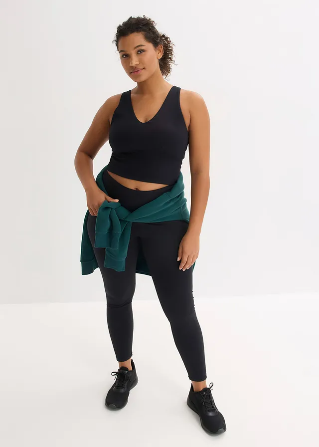 Top de sport avec soutien-gorge intégré, maintien modéré et toucher coton, Couleur: noir